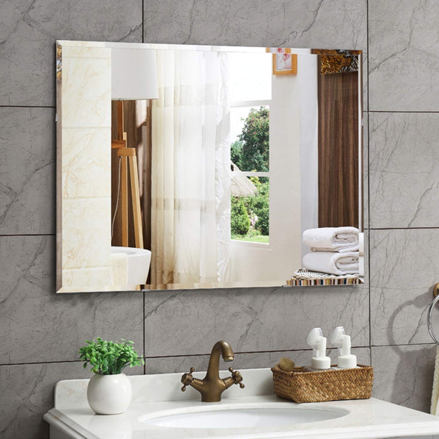 Frameless 5mm HD wall mirror with beveled smooth edges; a sleek rectangular design perfect for bathroom or home décor with clear, sharp reflection