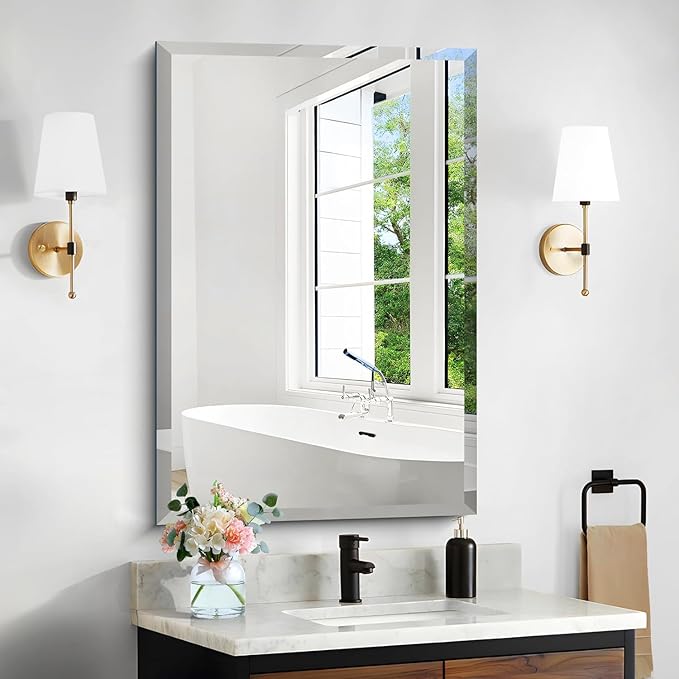 Frameless HD Rectangular mirror with beveled smooth edges and wall mount design; adds a clear, modern elegance to any home décor or living space