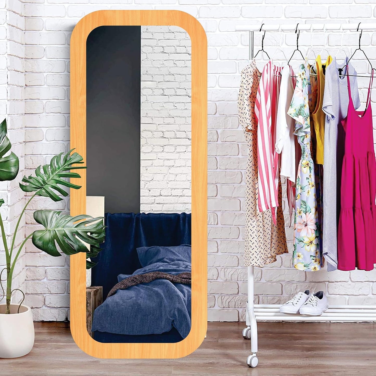 Rectangular 15x40 inch wall mirror with round corners and long fiber wood frame; perfect wall-mounted décor piece for a modern, stylish home look